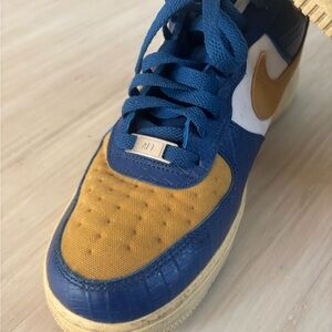 Nike Air Force 1 Undefeated
Blue and Gold. 
men's size 9